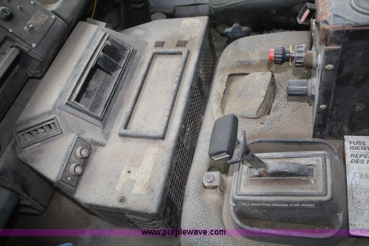 image for item F2511 1993 Ford Cargo 700 Elgin street sweeper