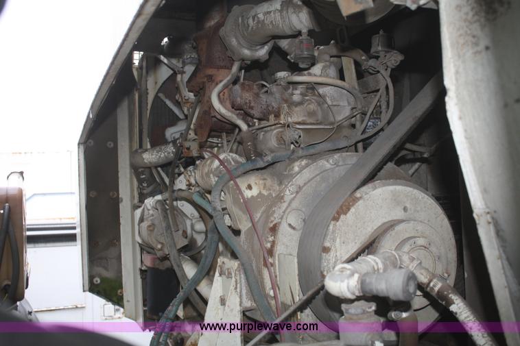 image for item F2511 1993 Ford Cargo 700 Elgin street sweeper