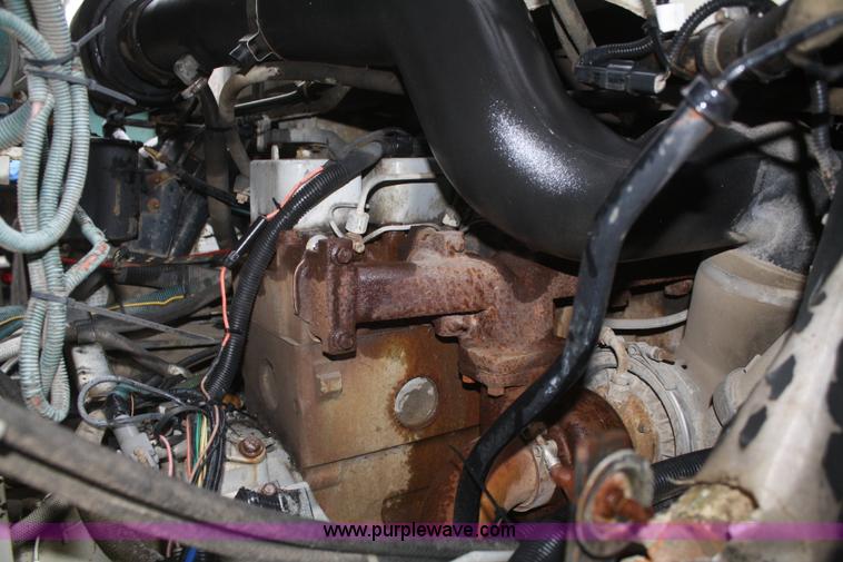 image for item F2511 1993 Ford Cargo 700 Elgin street sweeper