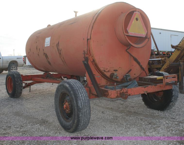 image for item F2847 1,000 gallon water tank on running gear