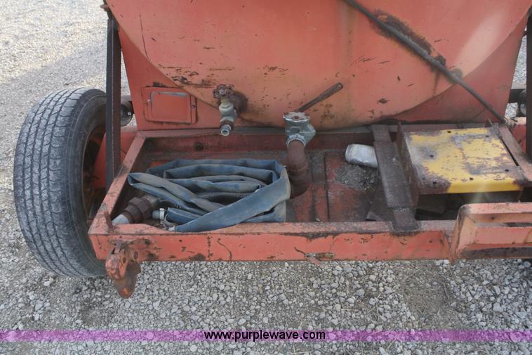 image for item F2847 1,000 gallon water tank on running gear