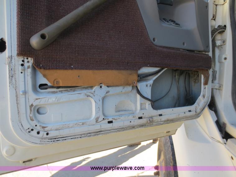 image for item F6587 1997 Ford Louisville dump truck