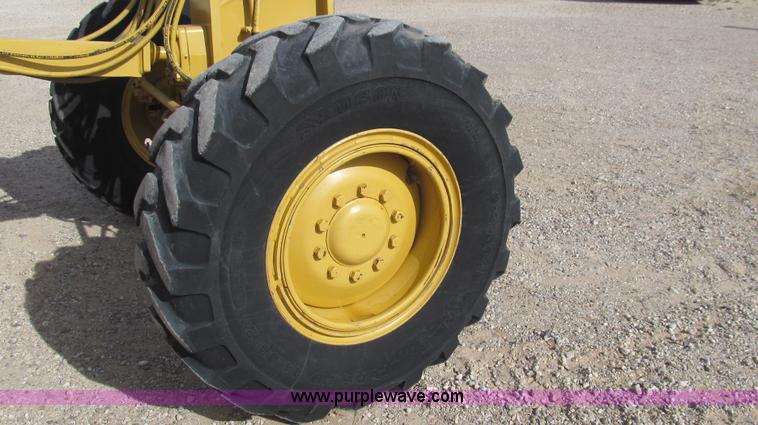image for item G5638 2002 Caterpillar 140H motor grader