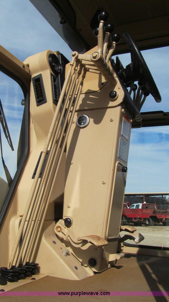 image for item G5638 2002 Caterpillar 140H motor grader