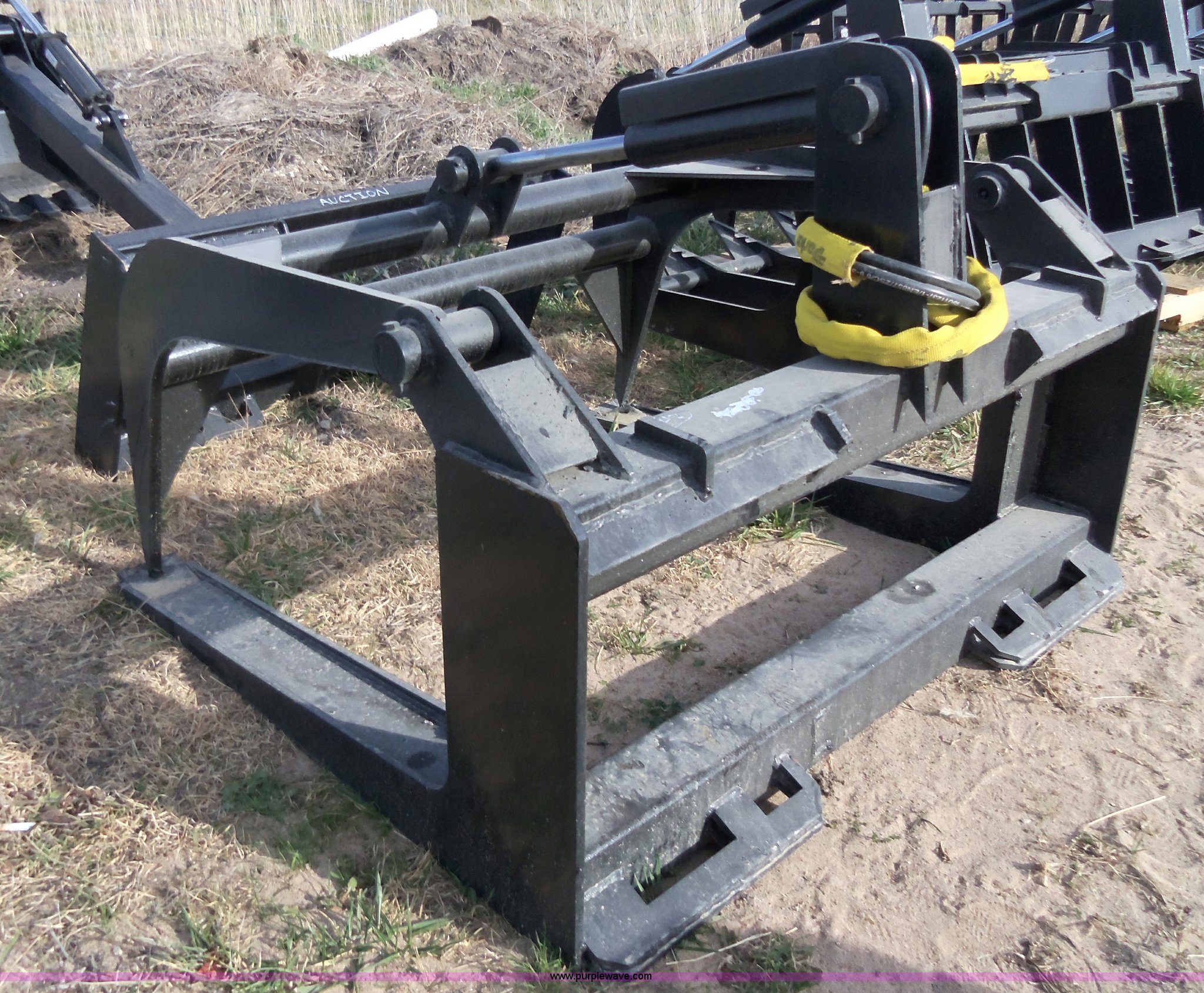 Wildkat heavy duty skid steer fork/hay grapple in Newton, KS Item
