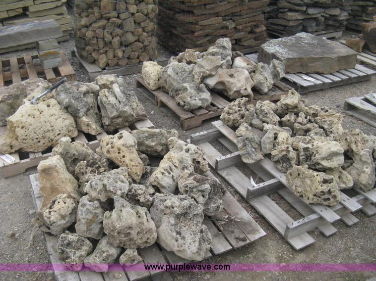 image for item AK9127 Various sizes of weathered holey limestone boulders on pallets