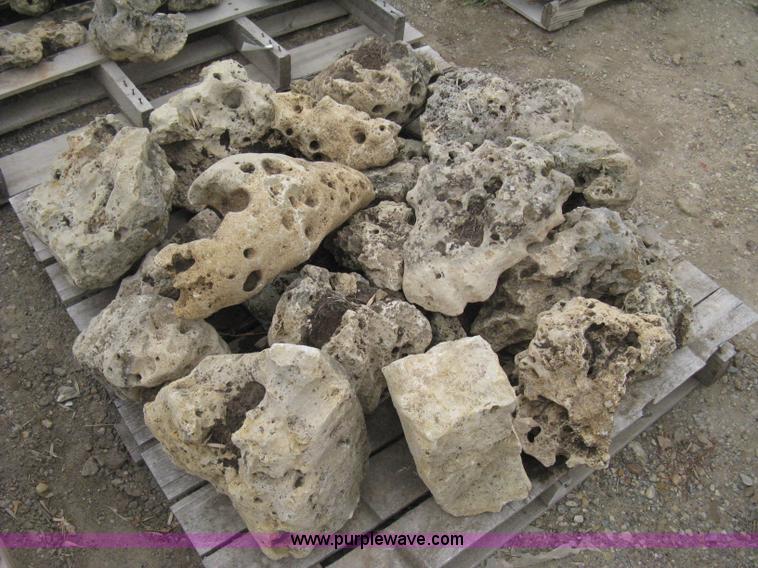 image for item AK9127 Various sizes of weathered holey limestone boulders on pallets