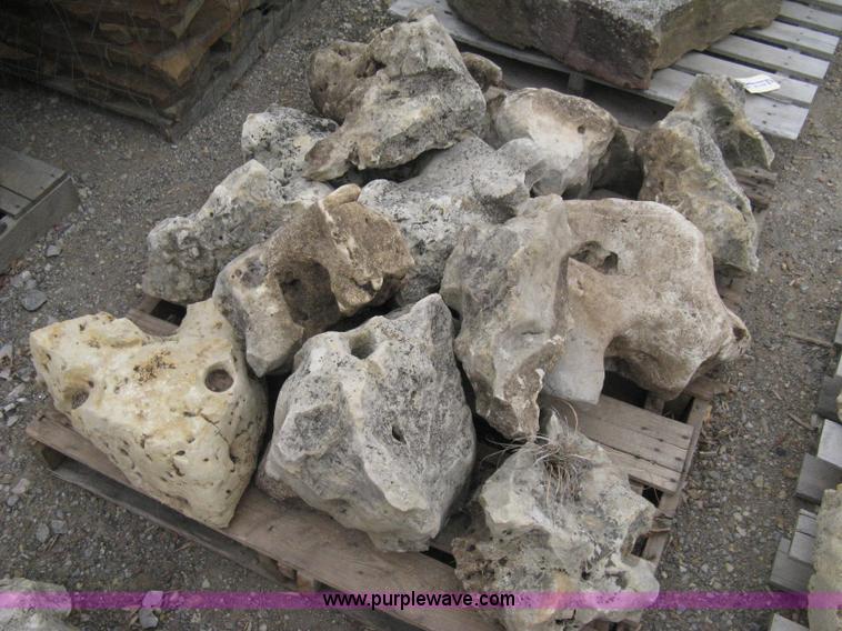 image for item AK9127 Various sizes of weathered holey limestone boulders on pallets