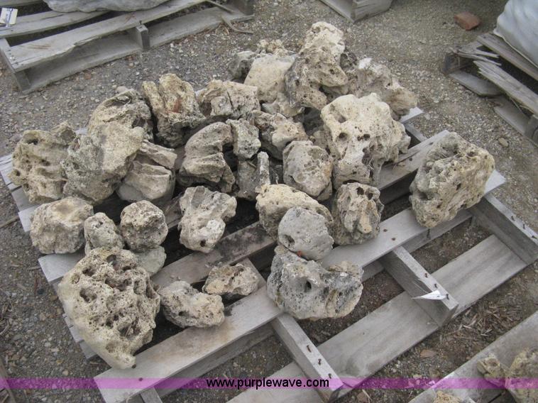 image for item AK9127 Various sizes of weathered holey limestone boulders on pallets