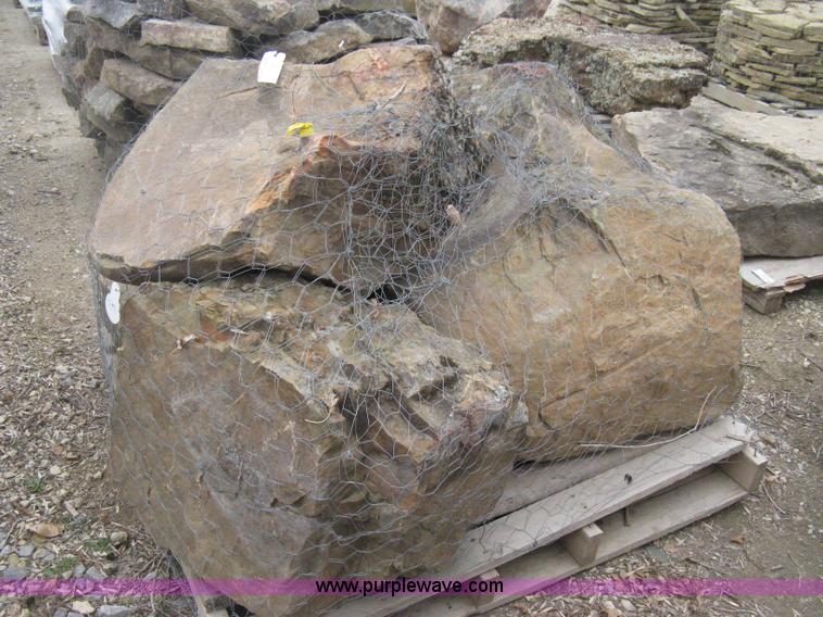 A pallet of moss rock boulders in Wichita, KS Item AK9216 sold