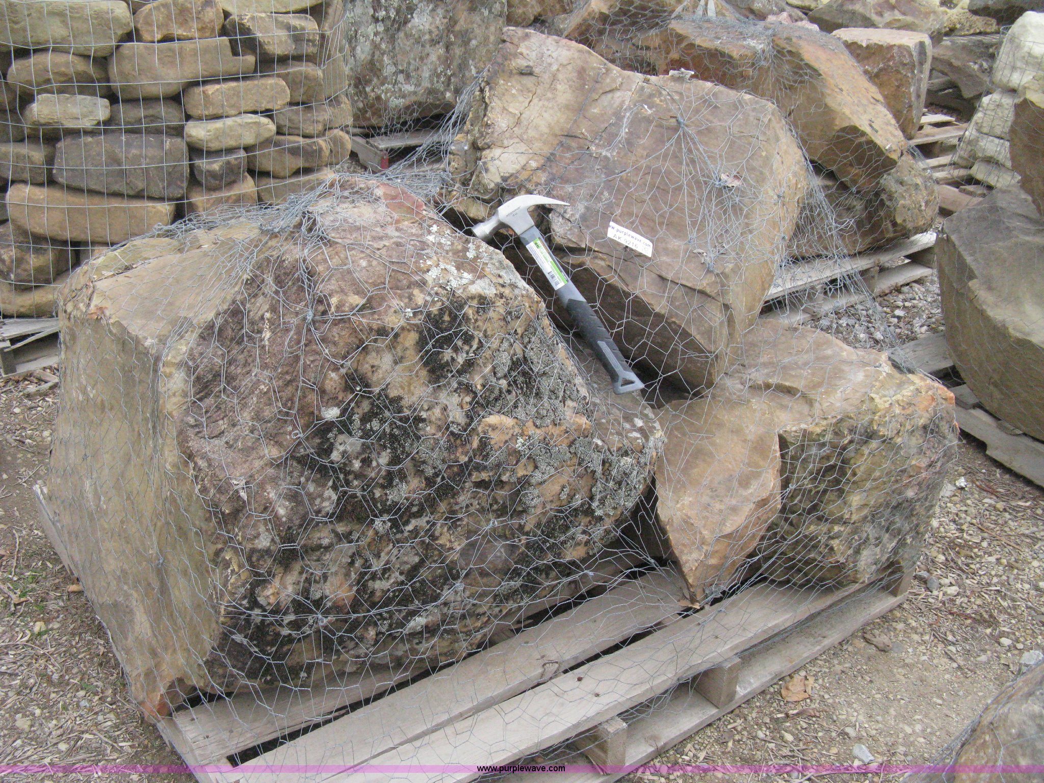 A pallet of moss rock boulders in Wichita, KS Item AK9216 sold