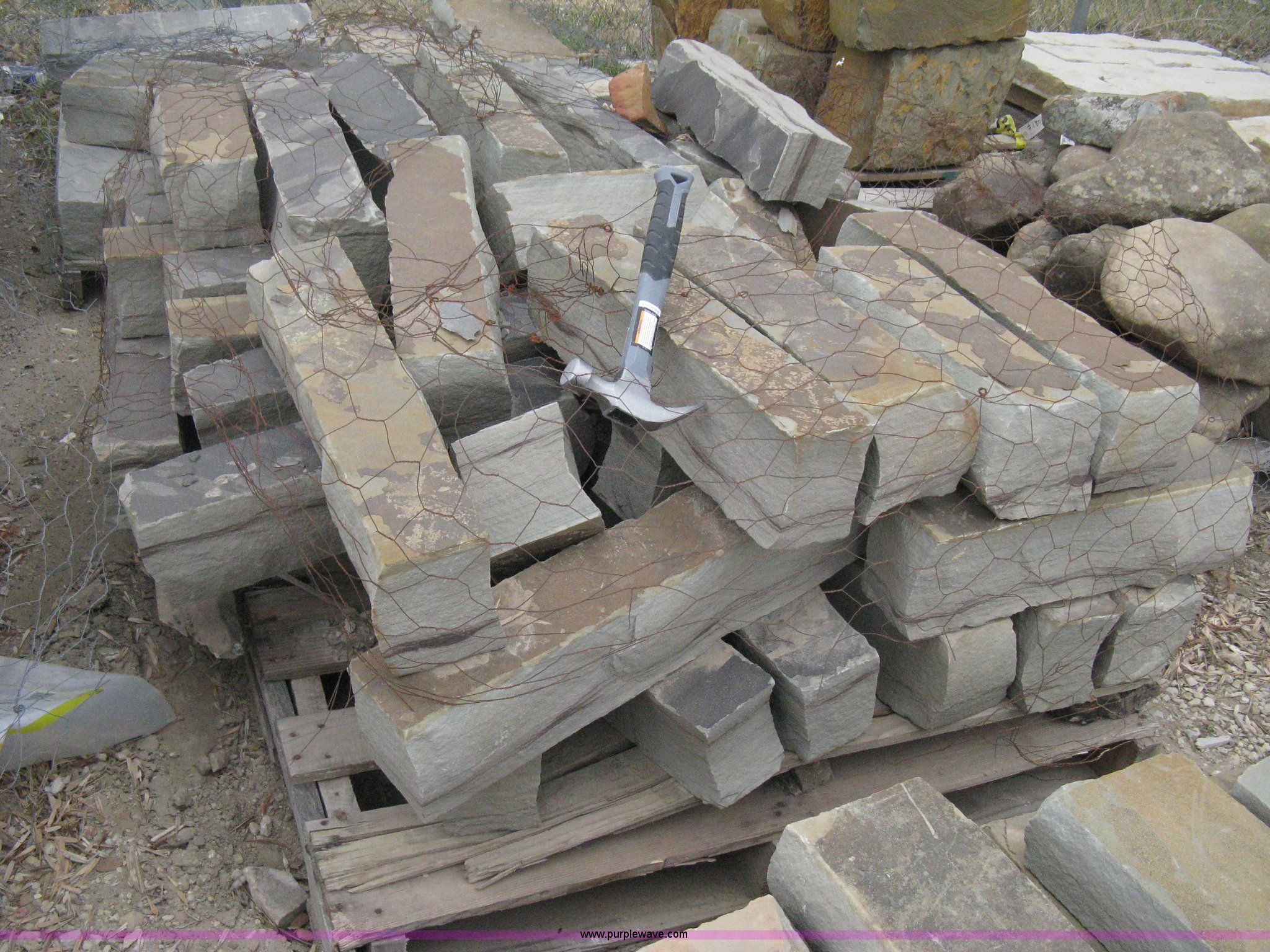 4 partial pallets of Oklahoma blue chopped stone edging/retaining wall