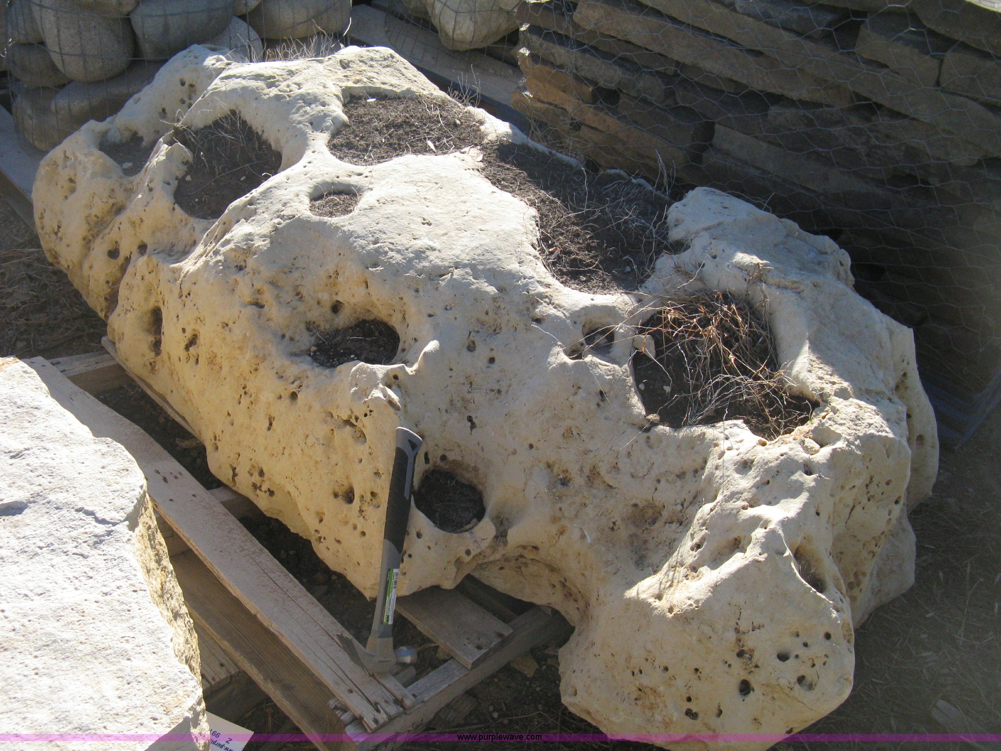 Holey limestone boulder in Wichita, KS | Item Z9916 sold | Purple Wave