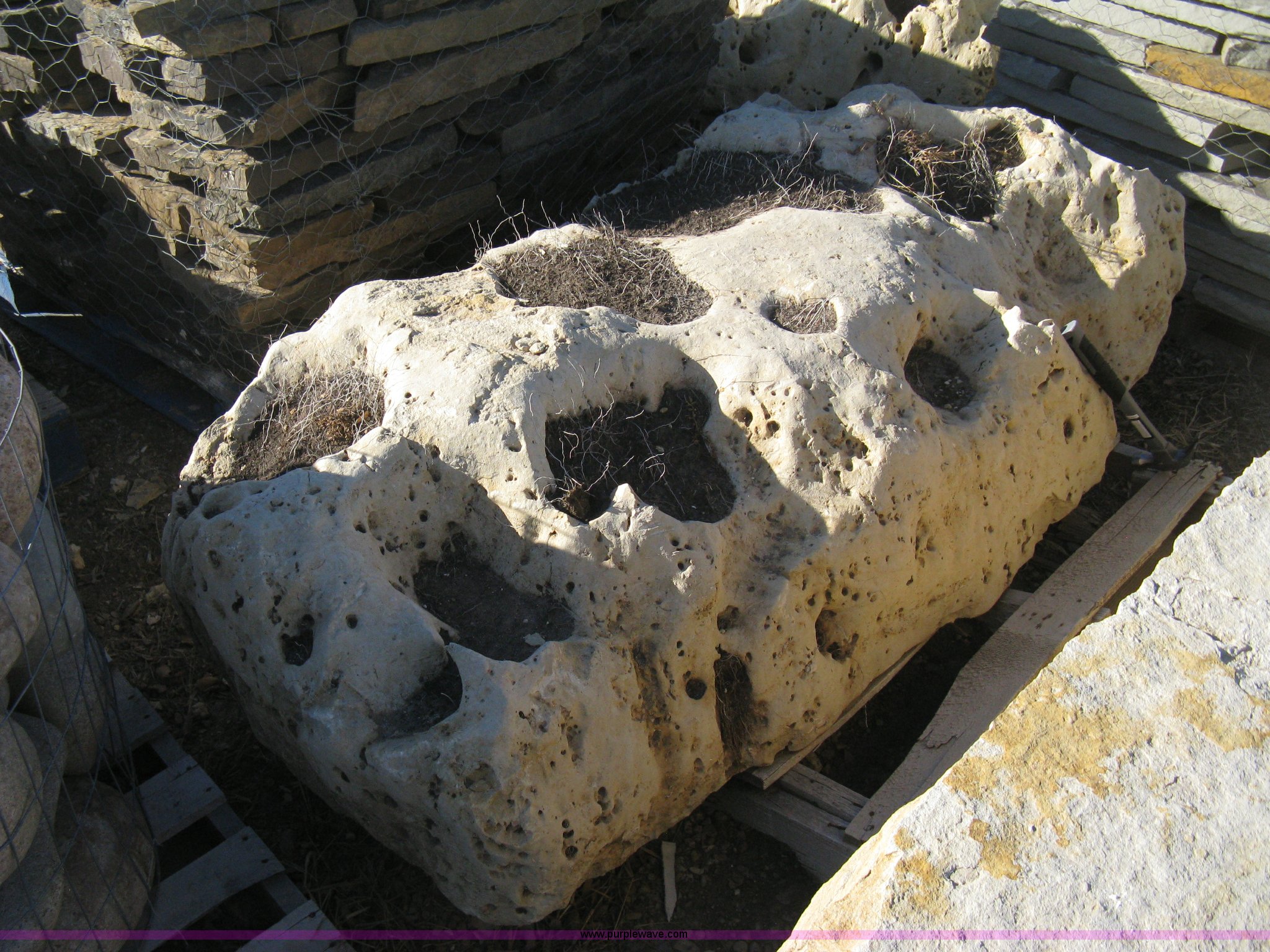 Holey limestone boulder in Wichita, KS | Item Z9916 sold | Purple Wave