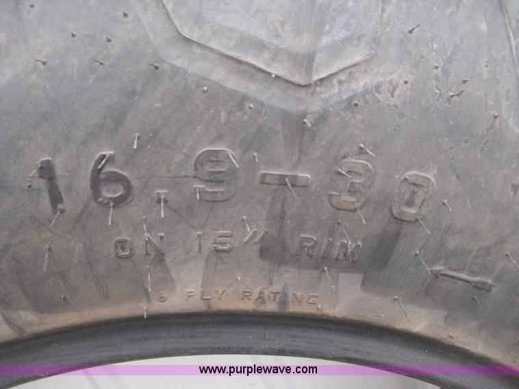 image for item E3090 (2) Firestone 16.9-30 tractor tires
