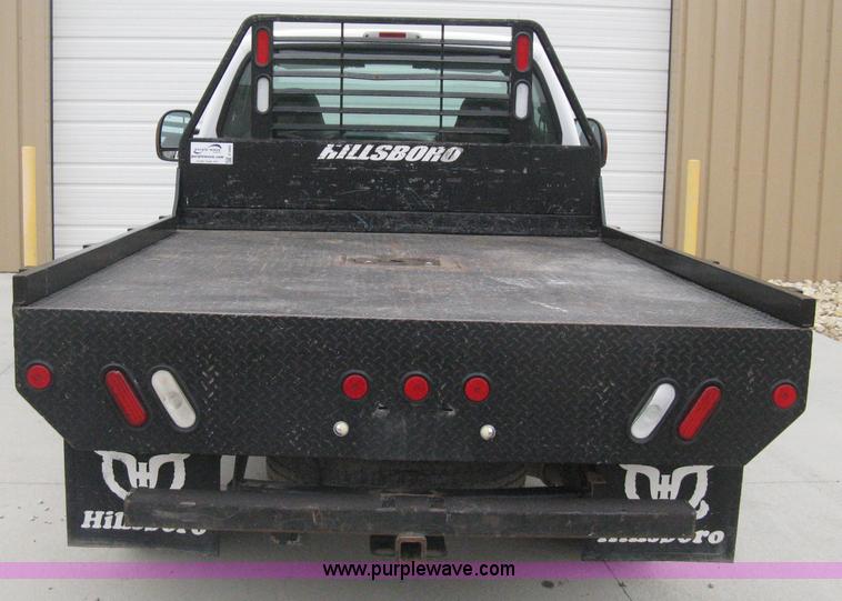 image for item E3082 2004 Ford F250 XLT Super Duty flatbed truck