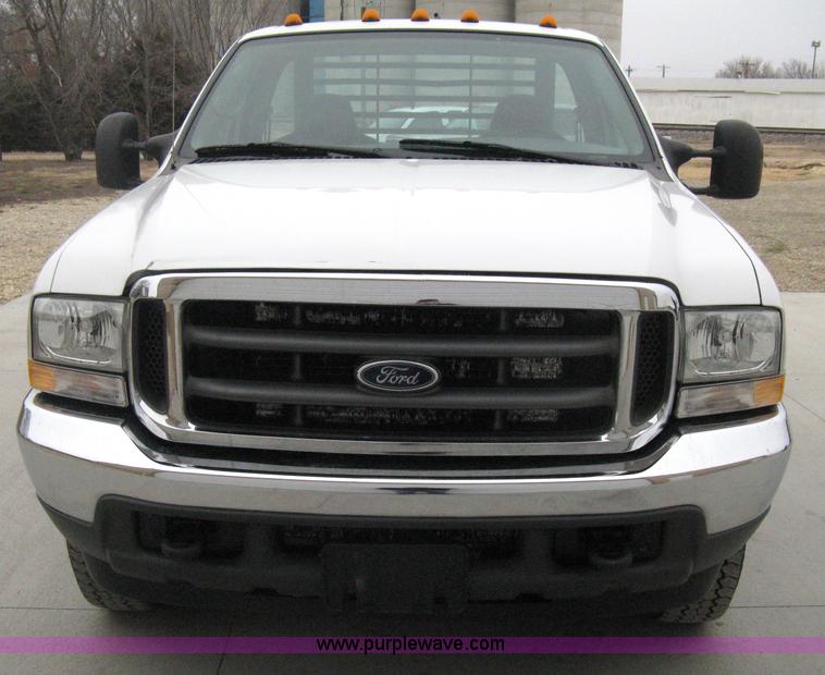 image for item E3082 2004 Ford F250 XLT Super Duty flatbed truck