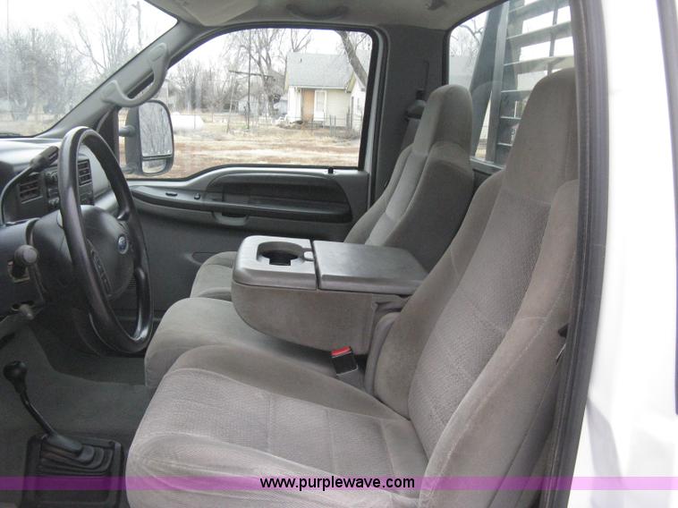 image for item E3082 2004 Ford F250 XLT Super Duty flatbed truck