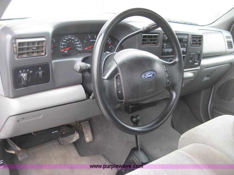 image for item E3082 2004 Ford F250 XLT Super Duty flatbed truck