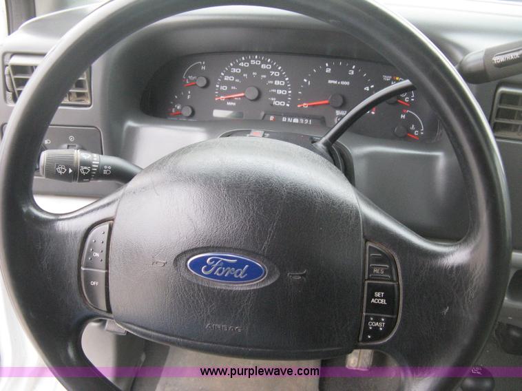 image for item E3082 2004 Ford F250 XLT Super Duty flatbed truck