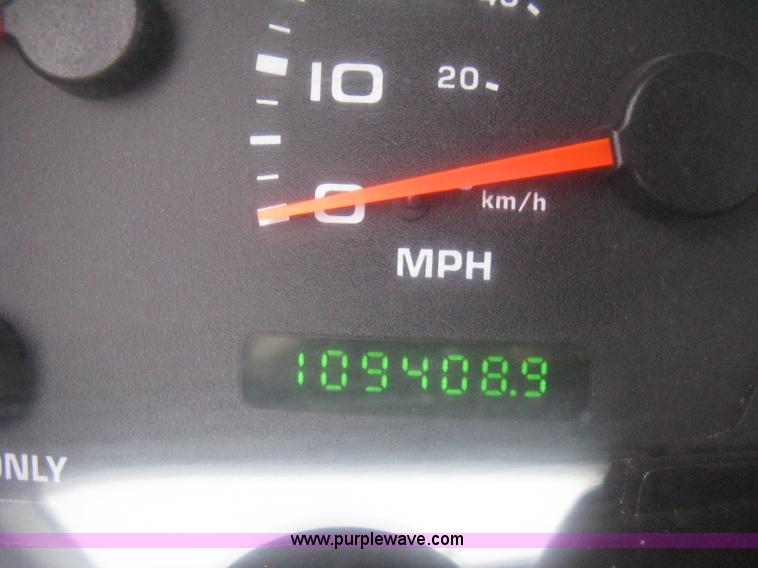 image for item E3082 2004 Ford F250 XLT Super Duty flatbed truck