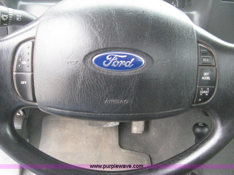 image for item E3082 2004 Ford F250 XLT Super Duty flatbed truck