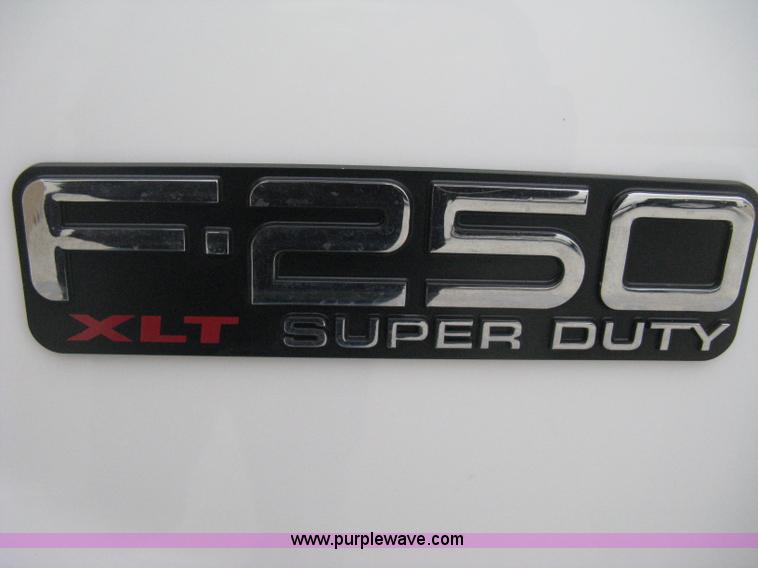 image for item E3082 2004 Ford F250 XLT Super Duty flatbed truck