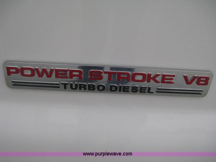 image for item E3082 2004 Ford F250 XLT Super Duty flatbed truck