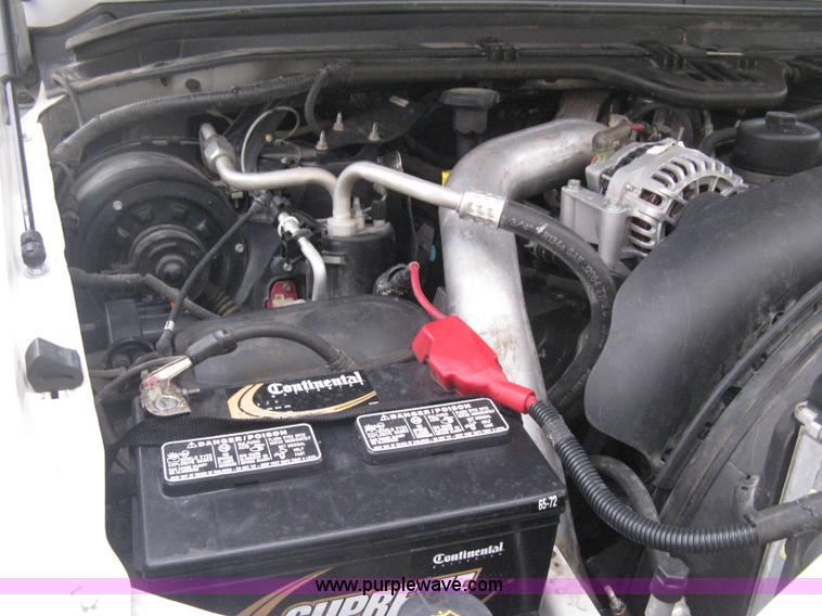 image for item E3082 2004 Ford F250 XLT Super Duty flatbed truck