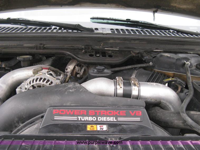 image for item E3082 2004 Ford F250 XLT Super Duty flatbed truck