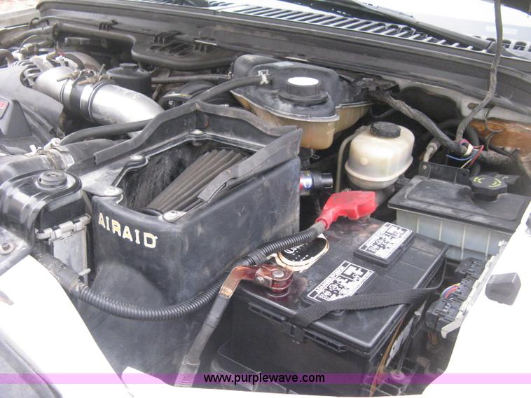 image for item E3082 2004 Ford F250 XLT Super Duty flatbed truck