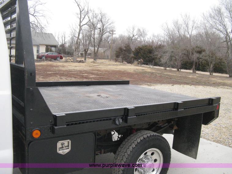 image for item E3082 2004 Ford F250 XLT Super Duty flatbed truck