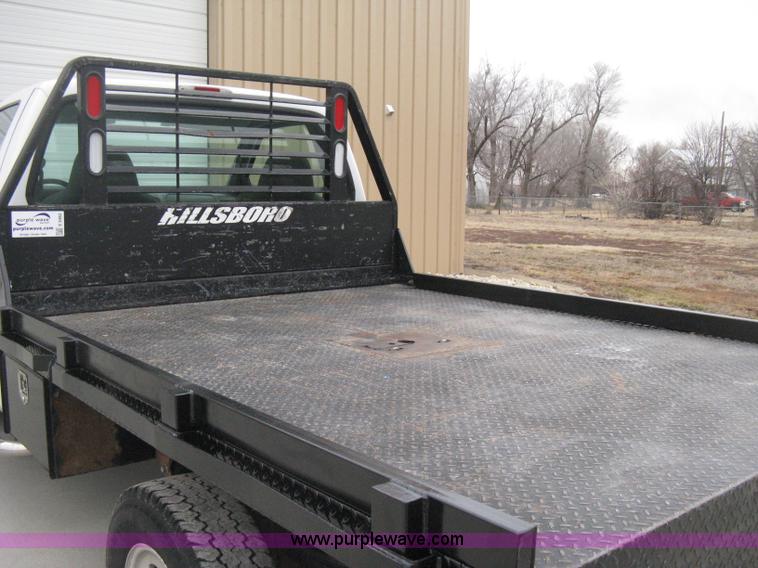 image for item E3082 2004 Ford F250 XLT Super Duty flatbed truck