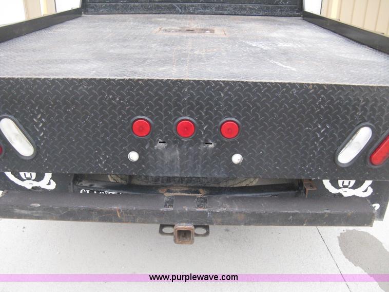 image for item E3082 2004 Ford F250 XLT Super Duty flatbed truck