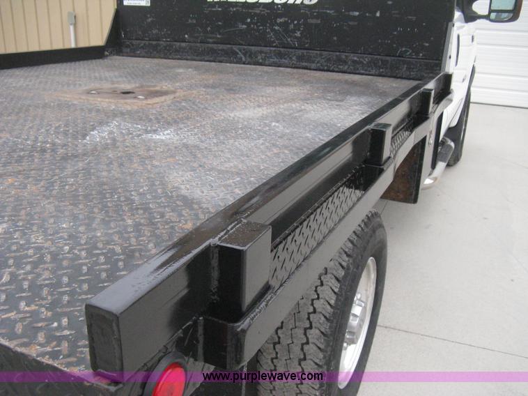 image for item E3082 2004 Ford F250 XLT Super Duty flatbed truck