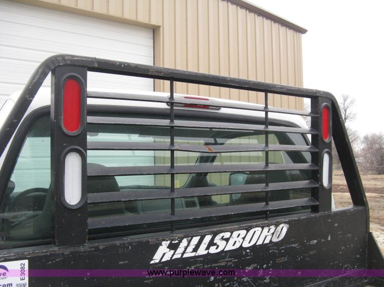 image for item E3082 2004 Ford F250 XLT Super Duty flatbed truck
