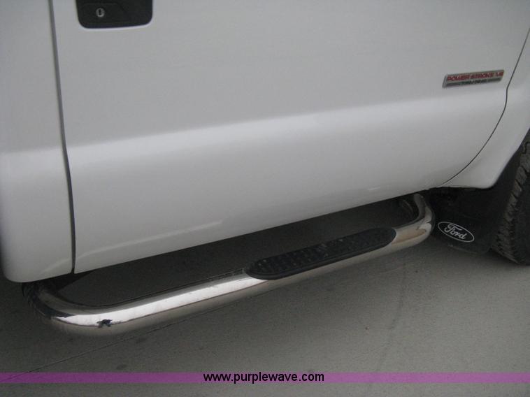 image for item E3082 2004 Ford F250 XLT Super Duty flatbed truck