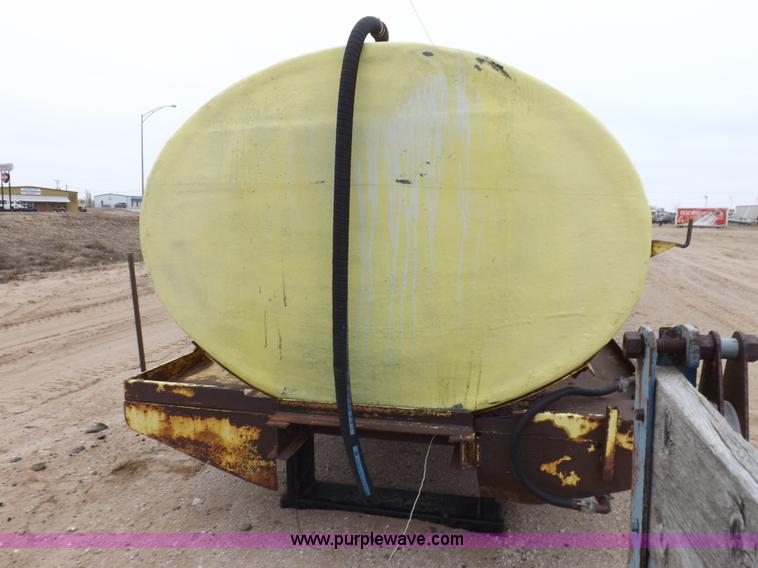 image for item F6390 Fiberglass tank on truck frame