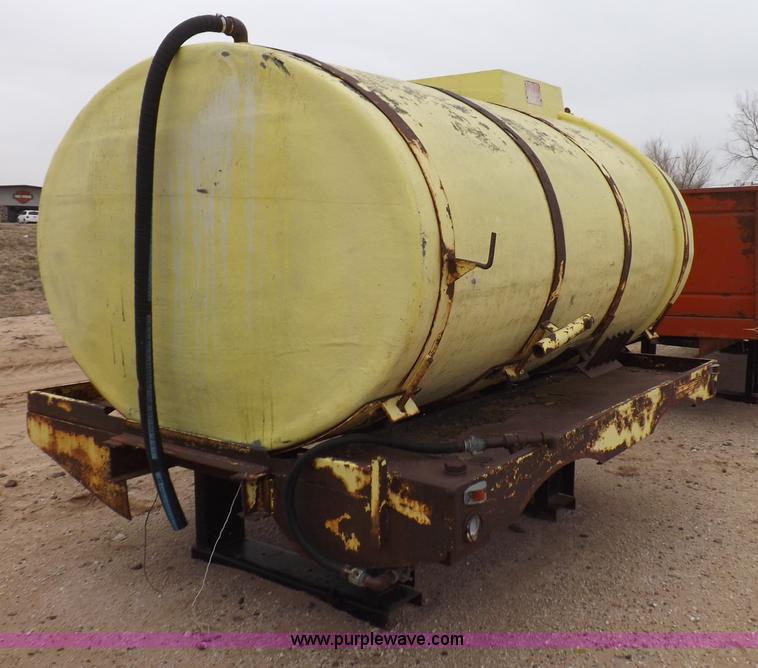 image for item F6390 Fiberglass tank on truck frame