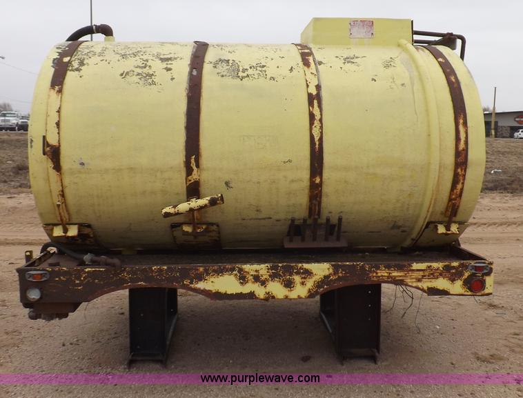 image for item F6390 Fiberglass tank on truck frame