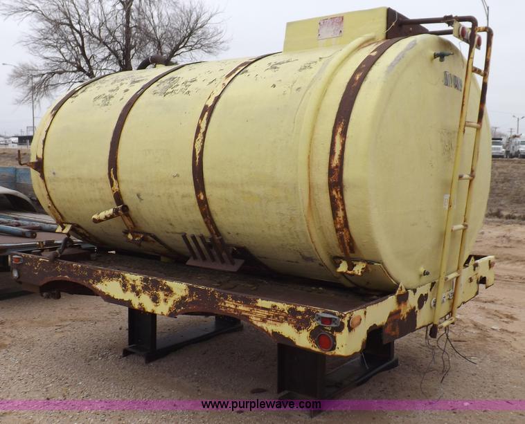 image for item F6390 Fiberglass tank on truck frame