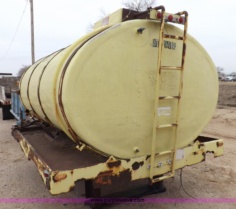 image for item F6390 Fiberglass tank on truck frame