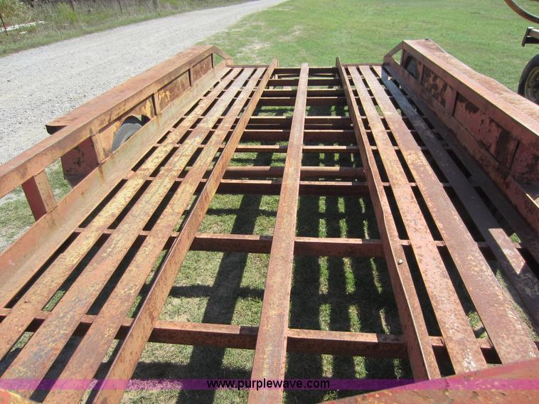 image for item F6518 1982 Chief 17'L x 84"W backhoe trailer