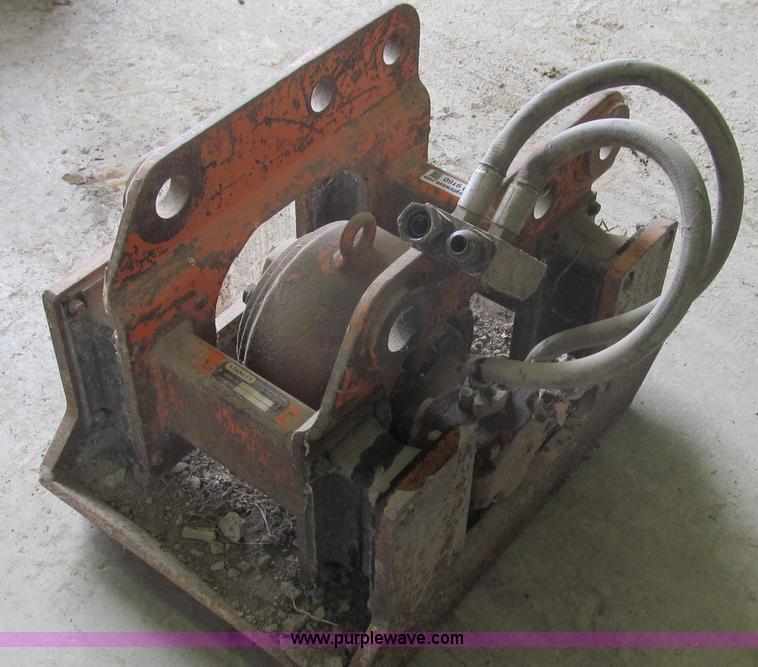 image for item O9160 Stanley hydraulic dirt tamper backhoe attachment