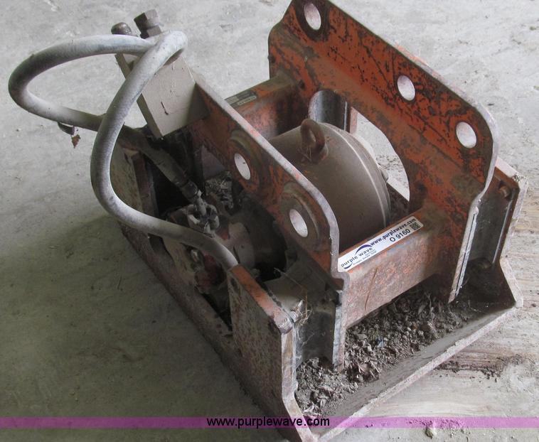 image for item O9160 Stanley hydraulic dirt tamper backhoe attachment