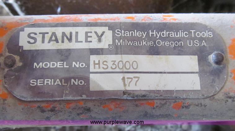 image for item O9160 Stanley hydraulic dirt tamper backhoe attachment