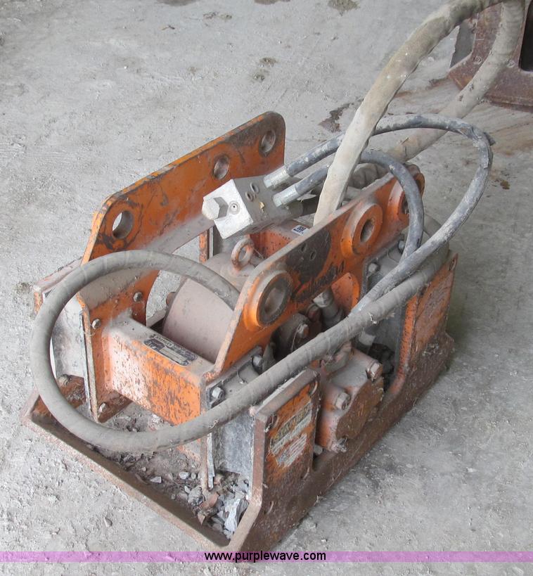 image for item O9161 Stanley hydraulic dirt tamper backhoe attachment