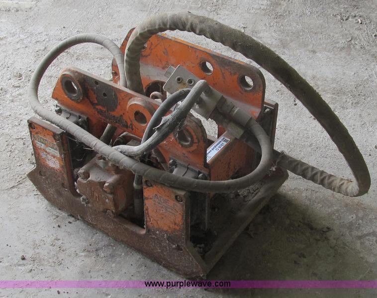 image for item O9161 Stanley hydraulic dirt tamper backhoe attachment