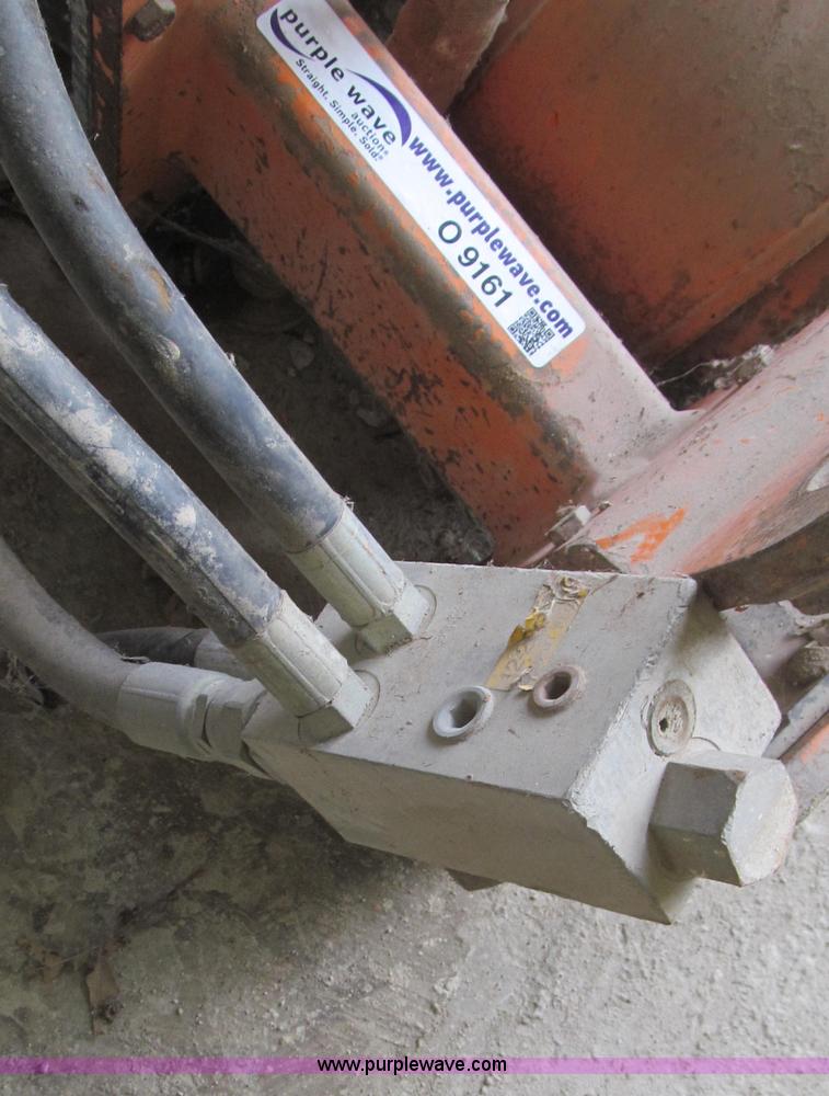 image for item O9161 Stanley hydraulic dirt tamper backhoe attachment