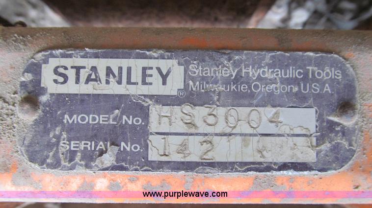 image for item O9161 Stanley hydraulic dirt tamper backhoe attachment